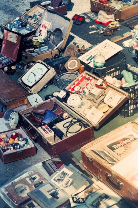 a group of boxes and objects on the floor