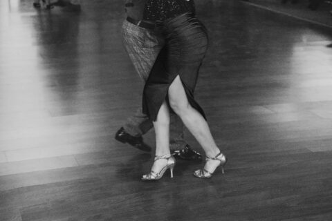 Two people dance the tango gracefully.